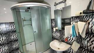 Апартаменты Студии на Гражданской Владимир Четырехместный номер с видом на сад-11